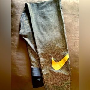 Nike leggings black and gold sparkles Size Large Wore 1 time